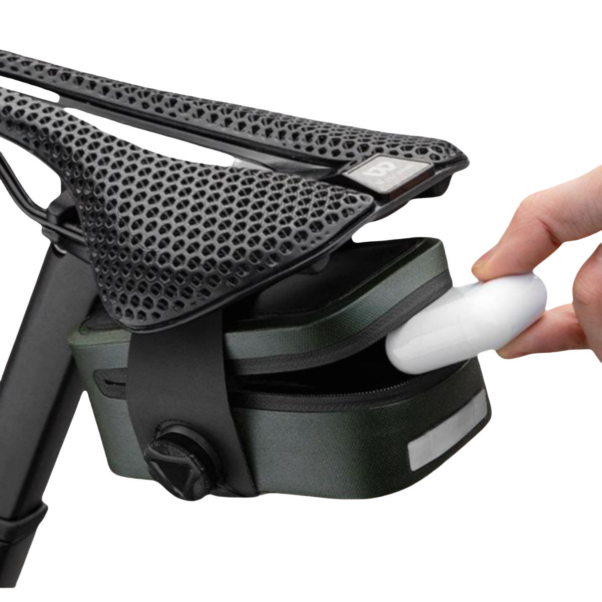 earphones inside Grundig 0.5L waterproof saddle bag – organized storage for essentials